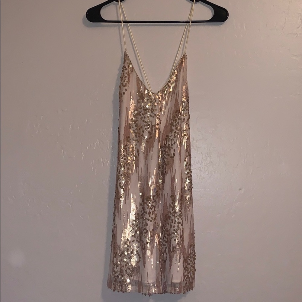 Gold sequin dress.